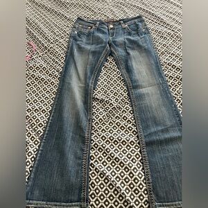 Grace in L.A. by L.A. Idol. Vintage early 2000s boot cut jeans.